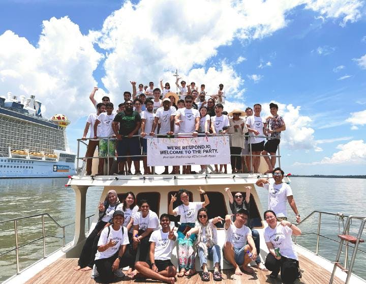 Team Respond.io celebrates the Series A fundraising on a cruise.